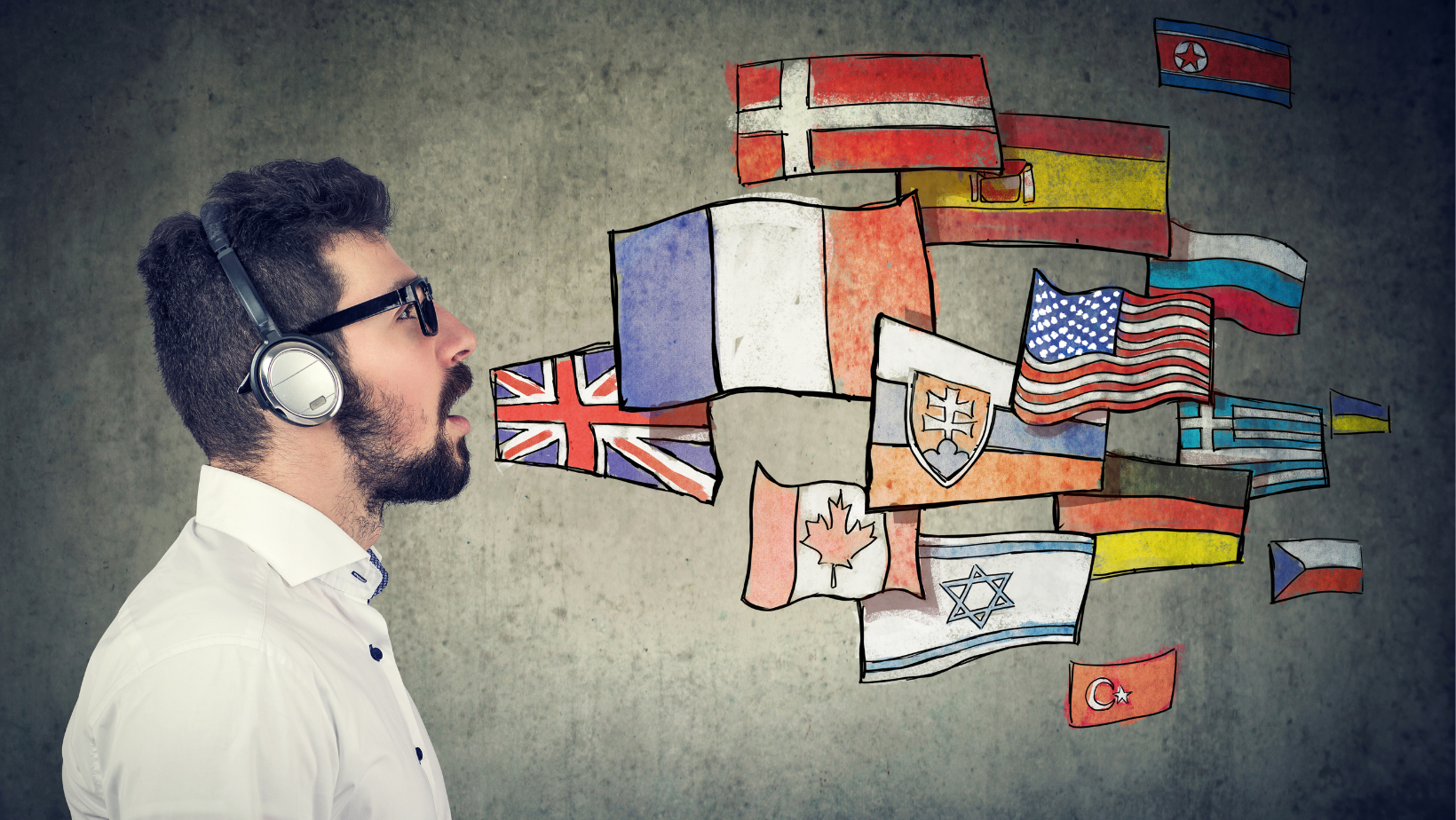 Man speaking while wearing headphones, many country flags, image represents a multilingual individual, perhaps an interpreter or a translator.